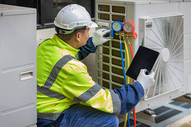 Professional Air Duct Cleaning technician working in Little Falls, NJ